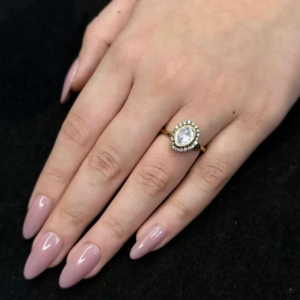 Elegant gold plated oval solitaire ring with sparkling crystal halo design for women fashion jewellery by Trinket Trails