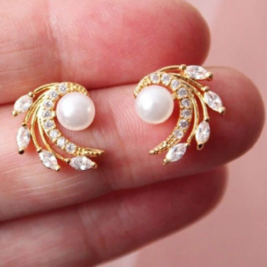 Elegant gold plated pearl swirl stud earrings with sparkling CZ diamond stones for women and girls