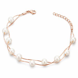 Elegant rose gold pearl bracelet for women with adjustable chain and minimal designer fashion jewellery style by Trinket Trails